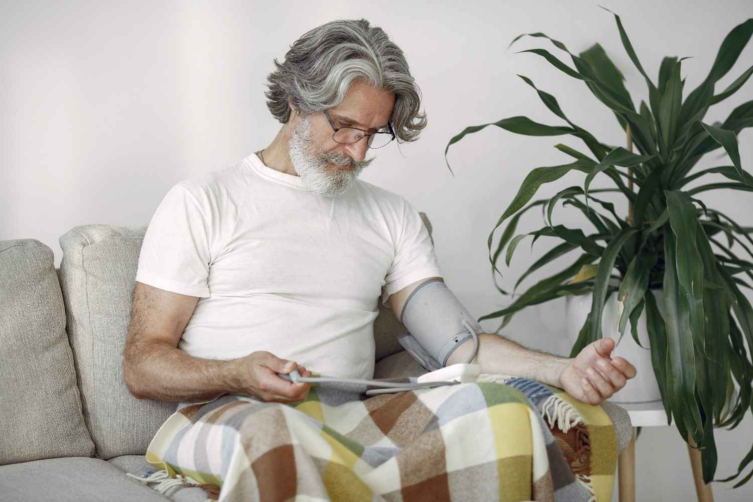 closeup-senior-male-70-75-years-old-measuring-pressure-man-measure-her-blood-pressure-health-care (1)
