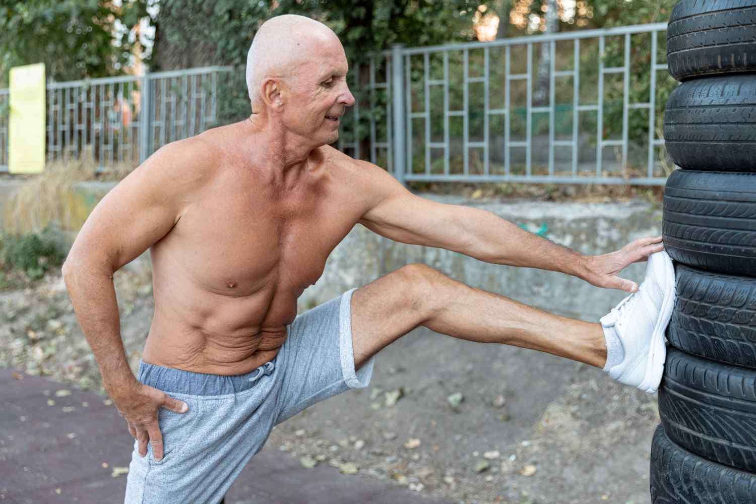 muscular-elder-man-stretching-outdoors (1)