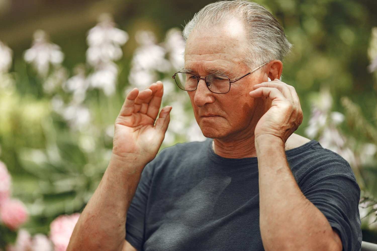 technology-people-communication-concept-senior-man-summer-park-grangfather-using-phone (1)